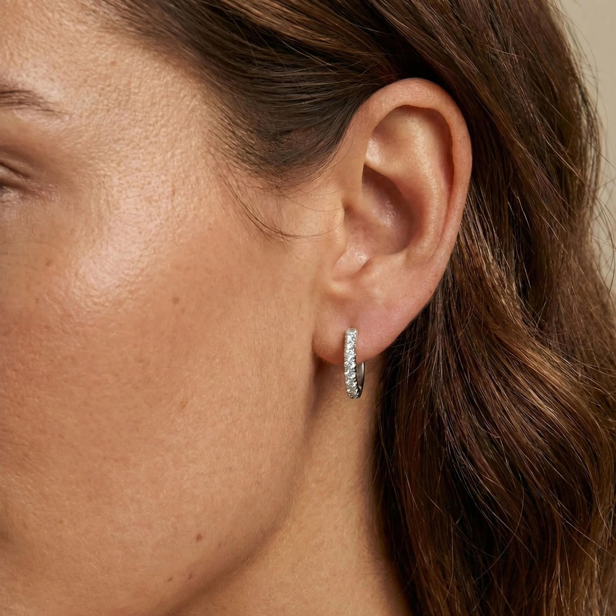 Crystal Huggie Hoop Earrings in Silver - Image 2