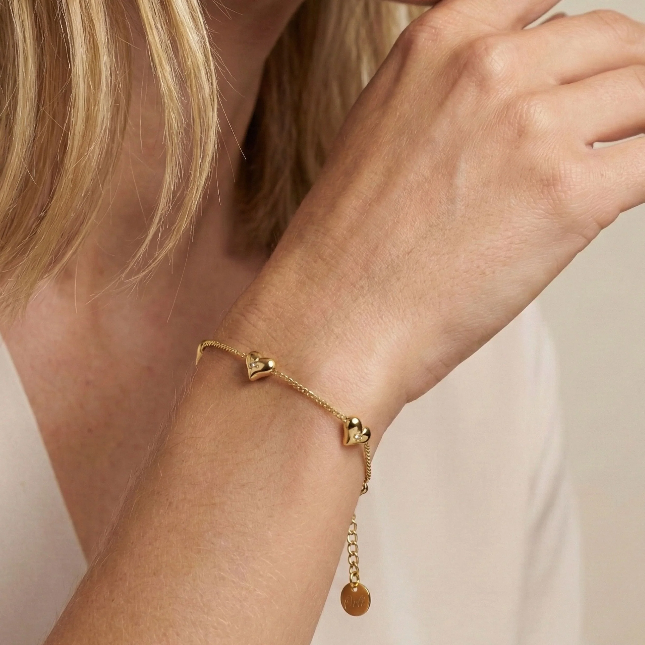 Crystal Starburst Multi Heart Bracelet in Gold - Image 3