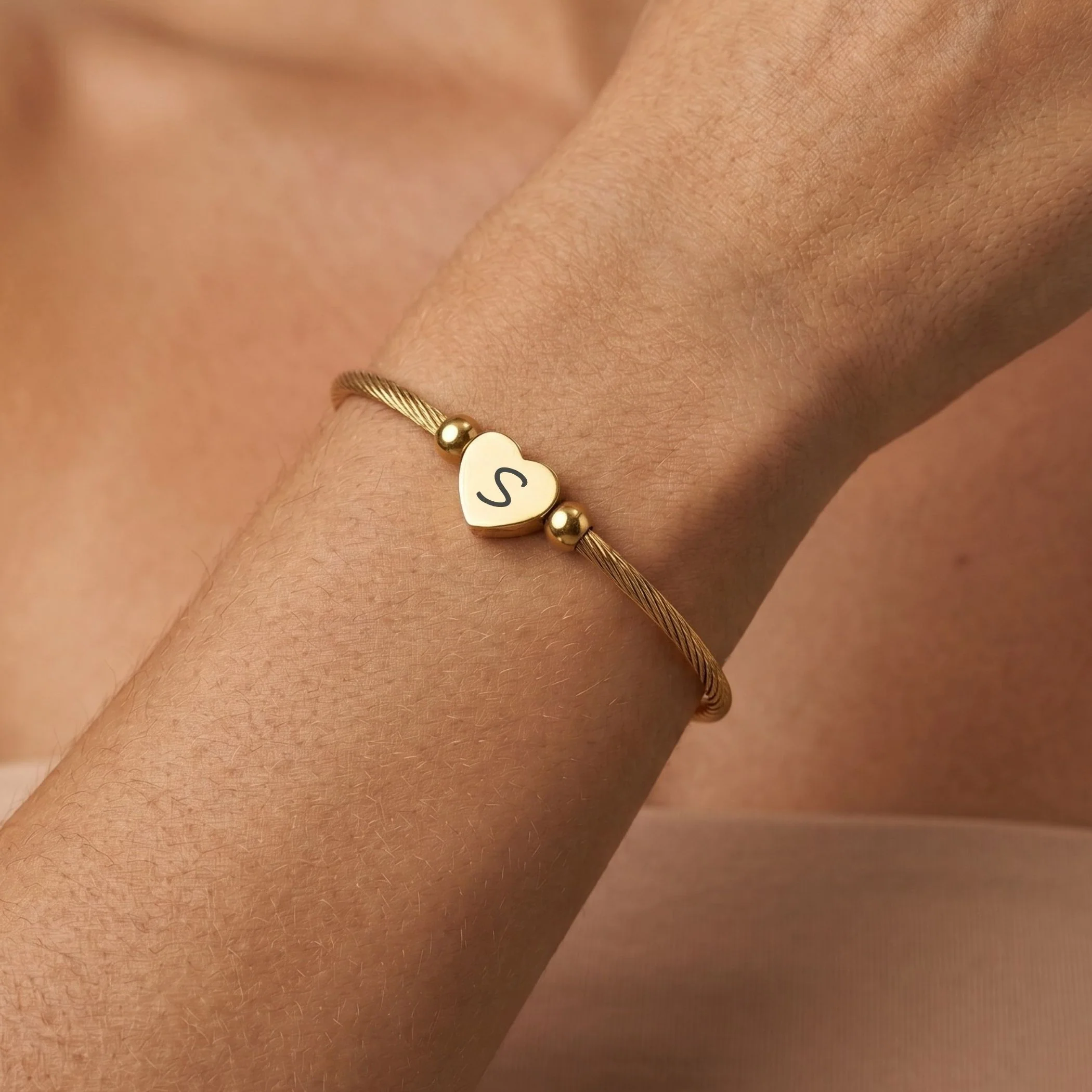 Initial Heart Twist Bangle in Gold - Image 2