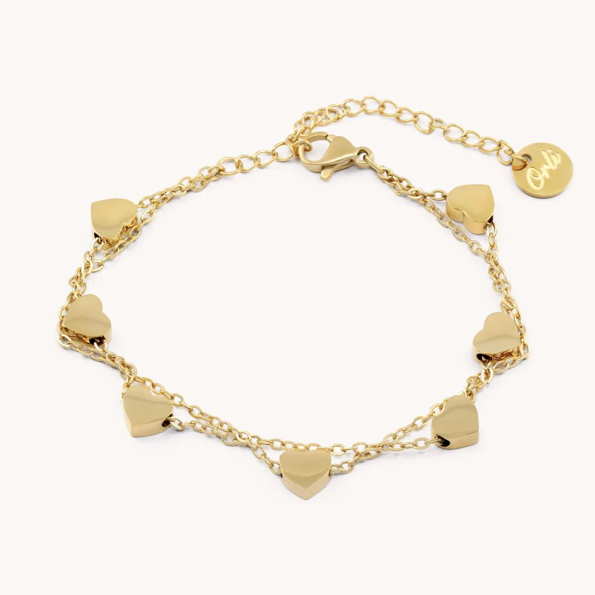 Layered Heart Charm Bracelet in Gold - Image 2
