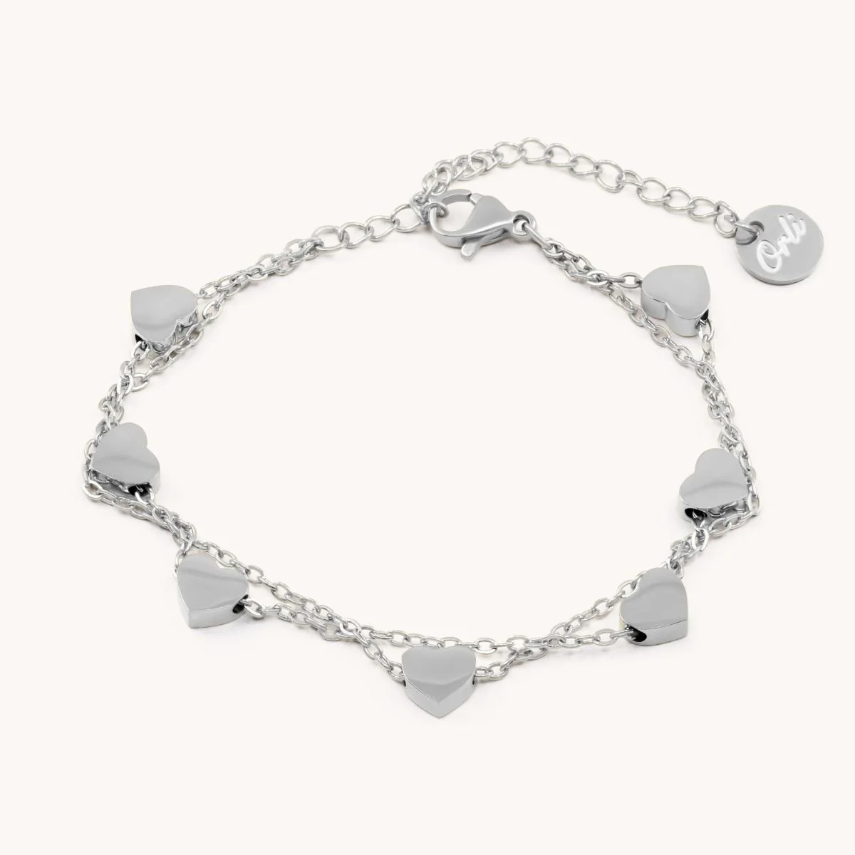 Layered Heart Charm Bracelet in Silver - Image 2
