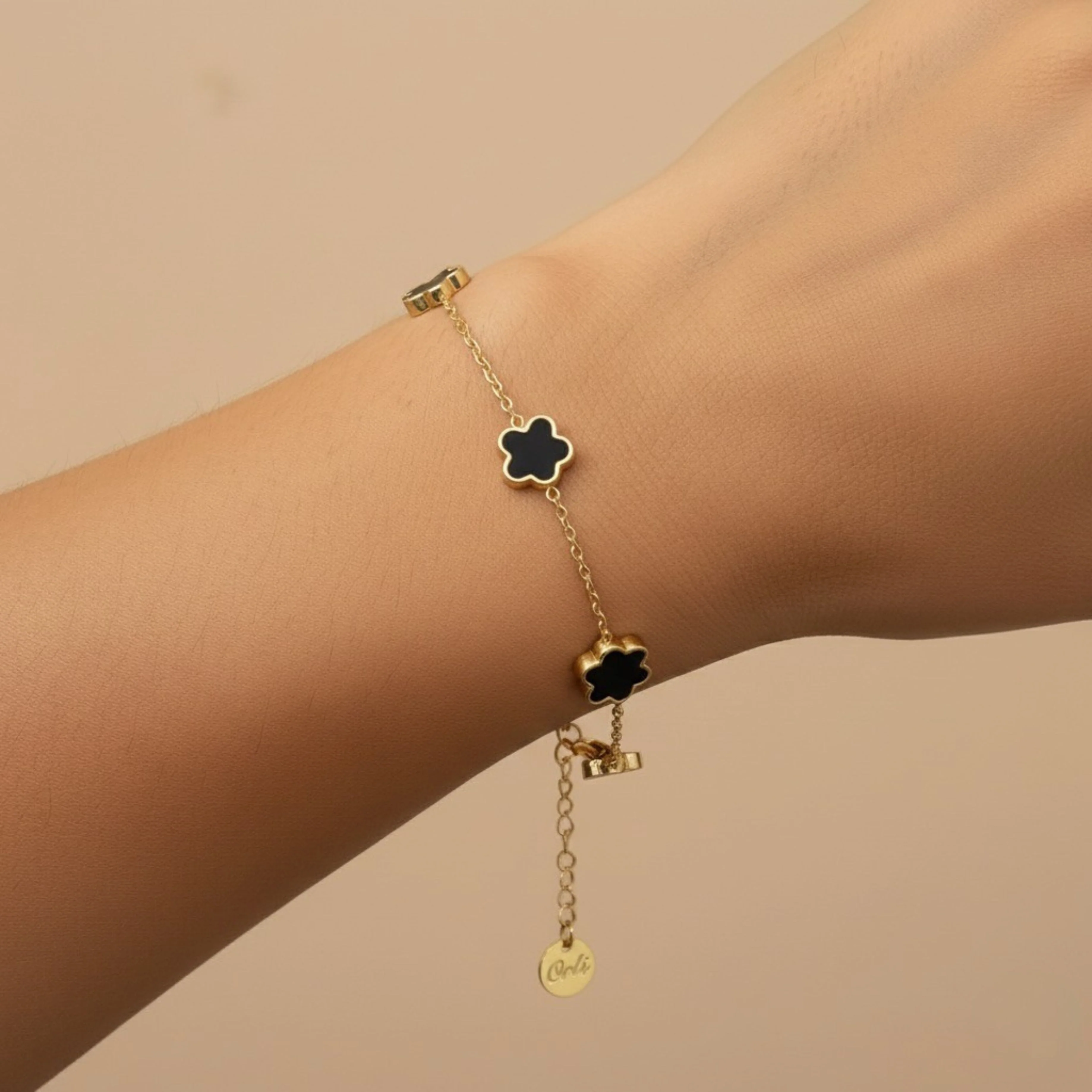 Mini Black Multi Clover Bracelet in Gold - Image 3